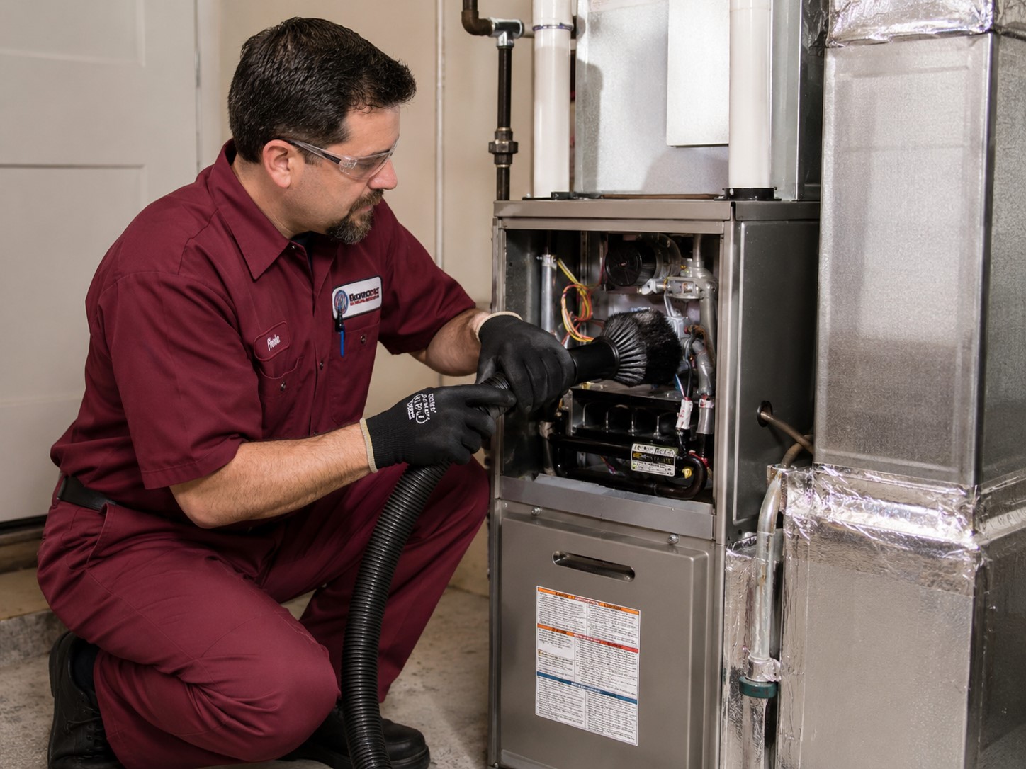 Red Rocks Air Duct Technician Doing Furnace Cleaning in Denver